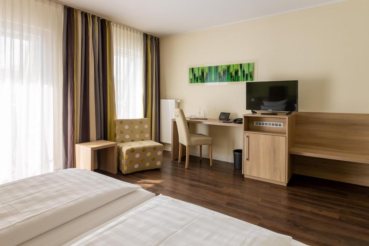Hotel Am Schlosspark Garni Husum Kültér fotó